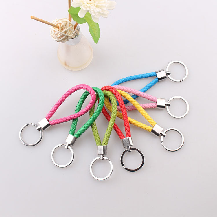 Braided leather cord bell key chain