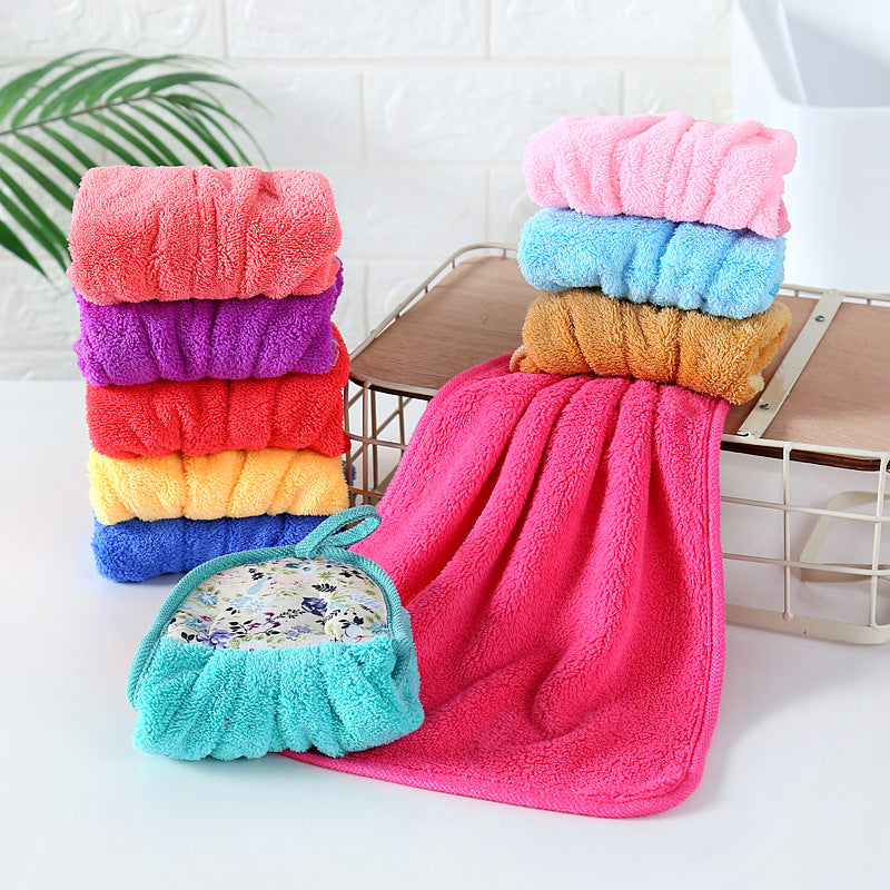 Soft and absorbent padded coral fleece hanging towel