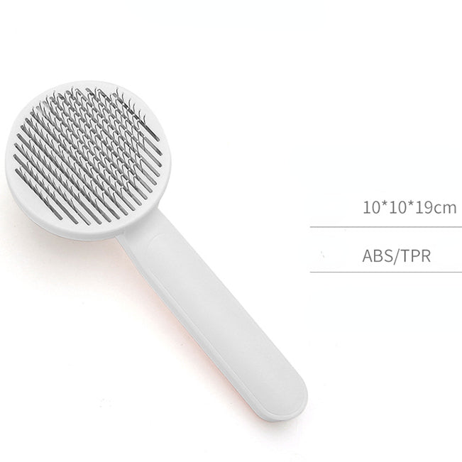 Button pet grooming comb