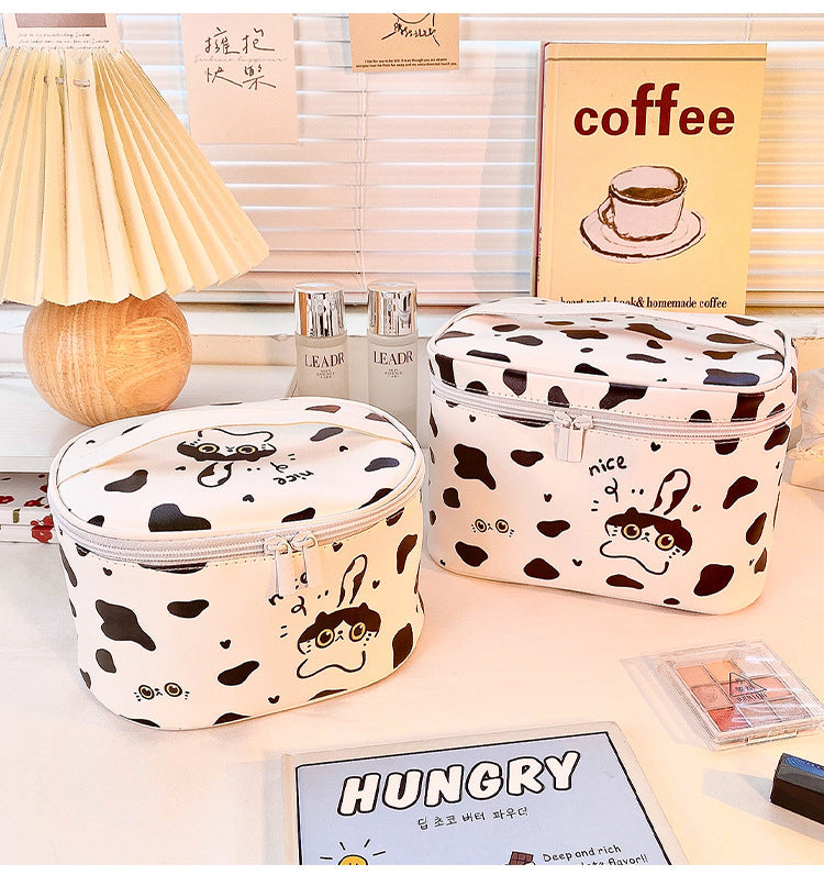 Round cartoon black and white cow cosmetic bag