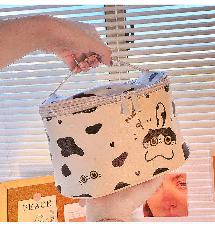 Round cartoon black and white cow cosmetic bag