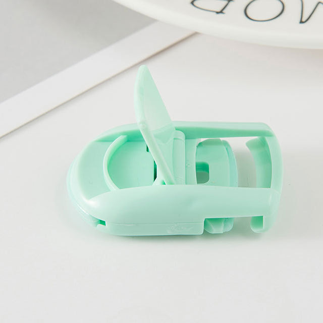 Mini portable eyelash curler