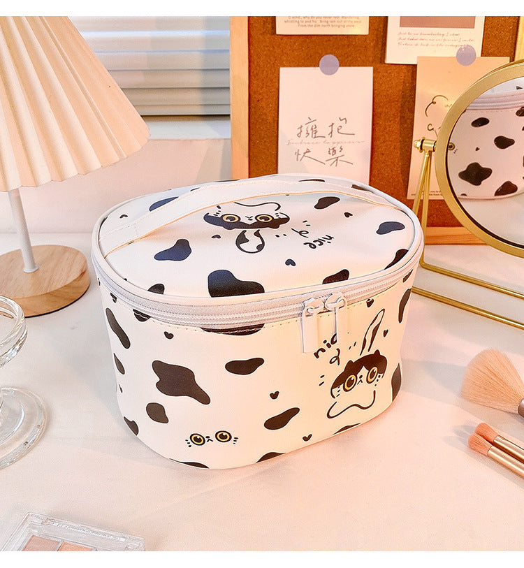 Round cartoon black and white cow cosmetic bag