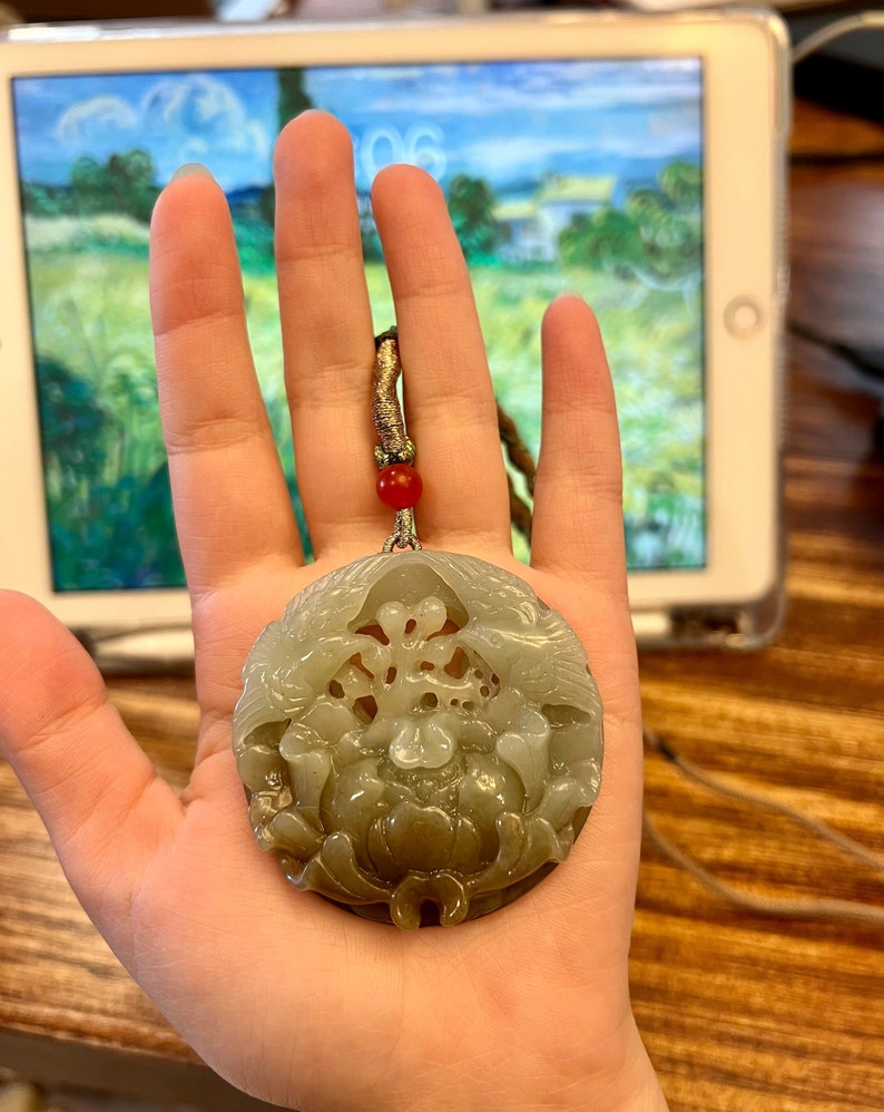 A Creatively Double-sided Carved Jade Pendant Necklace